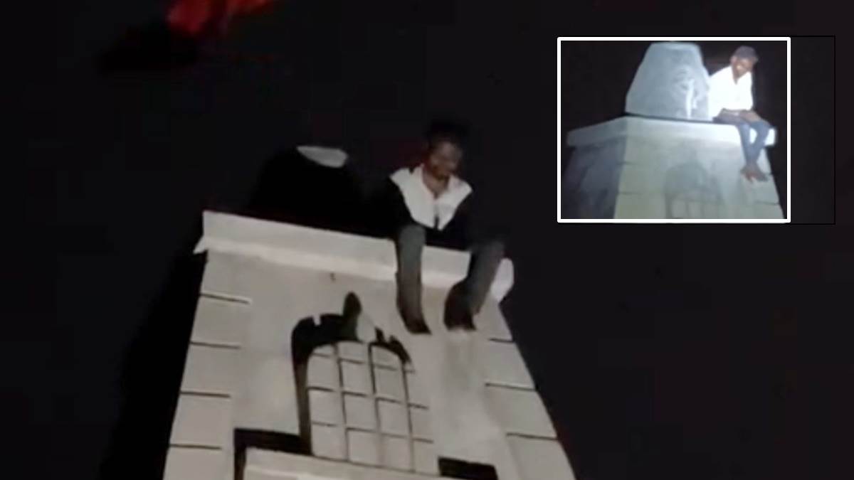 धार जिले में भिलट देव मंदिर के शिखर पर चढ़ा नशे में धुत युवक, लोग चिल्लाते रहे- नीचे उतर जा भाई