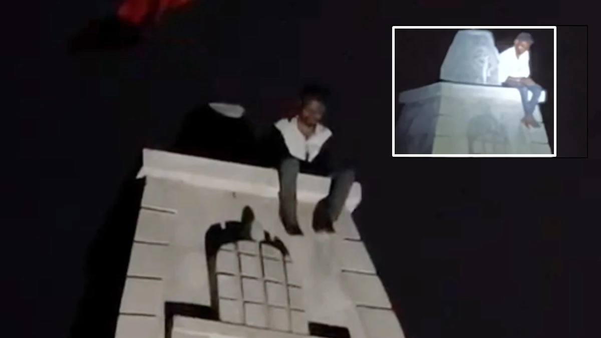 धार जिले में भिलट देव मंदिर के शिखर पर चढ़ा नशे में धुत युवक, लोग चिल्लाते रहे- नीचे उतर जा भाई