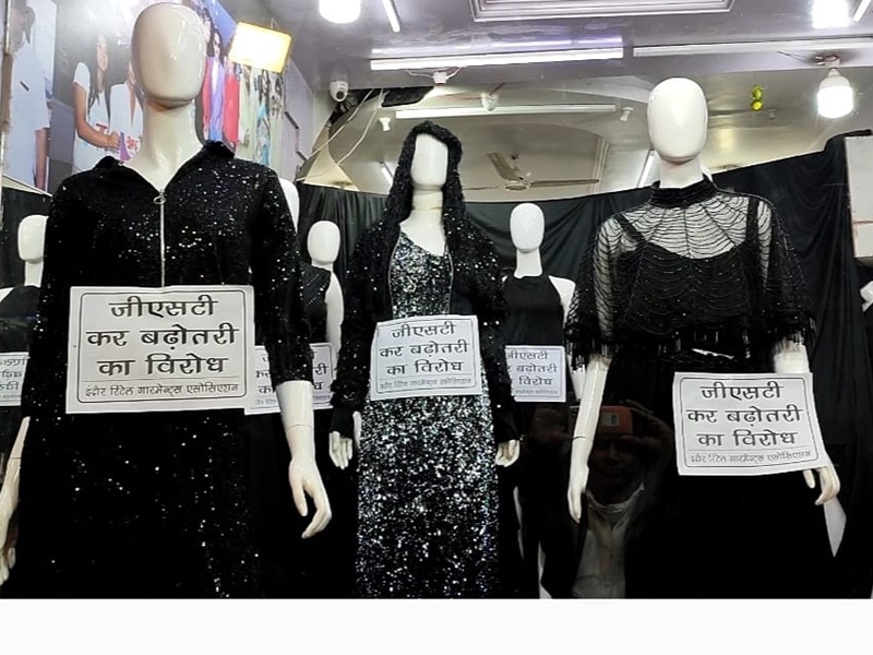 Unique protest against increasing rate of GST shops adorned with black  clothes in Indore