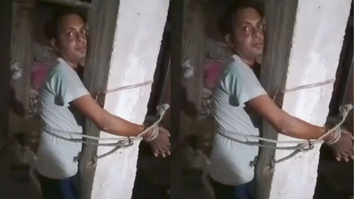 Shivpuri: पड़ोसी के घर में घुसा युवक, लोगों ने पिलर से बांधकर पीटा, VIDEO वायरल